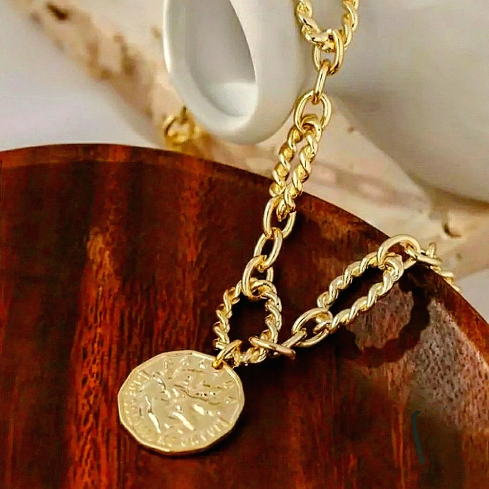 Copper twisted bracelet w/2 sided charm; NWOT